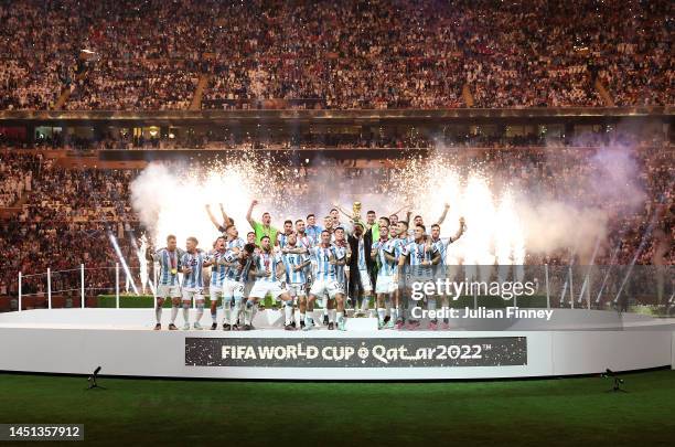 Lionel Messi of Argentina lifts the FIFA World Cup Qatar 2022 Winner's Trophy during the FIFA World Cup Qatar 2022 Final match between Argentina and...