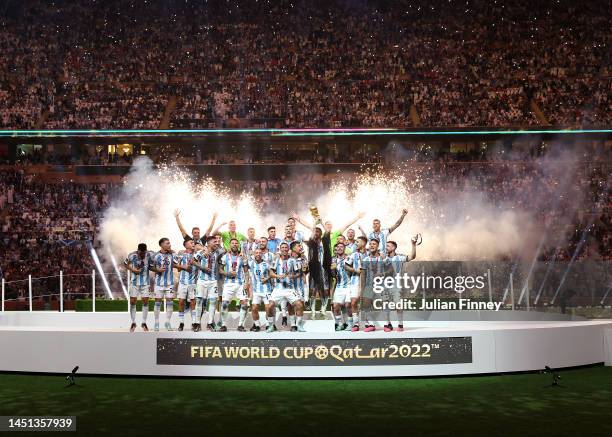 Lionel Messi of Argentina lifts the FIFA World Cup Qatar 2022 Winner's Trophy during the FIFA World Cup Qatar 2022 Final match between Argentina and...