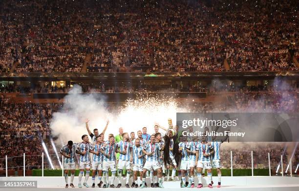 Lionel Messi of Argentina lifts the FIFA World Cup Qatar 2022 Winner's Trophy during the FIFA World Cup Qatar 2022 Final match between Argentina and...