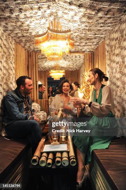 James Long, Bianca Jagger and Roksanda Ilincic attend the press view of Harvey Nichols British Designers Secret Garden Installation at Harvey Nichols...