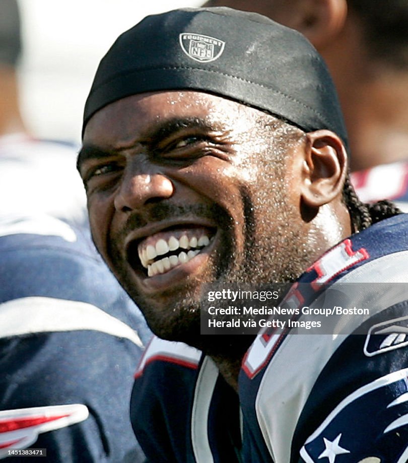New England Patriots wide receiver Randy Moss smiles on the bench News  Photo - Getty Images