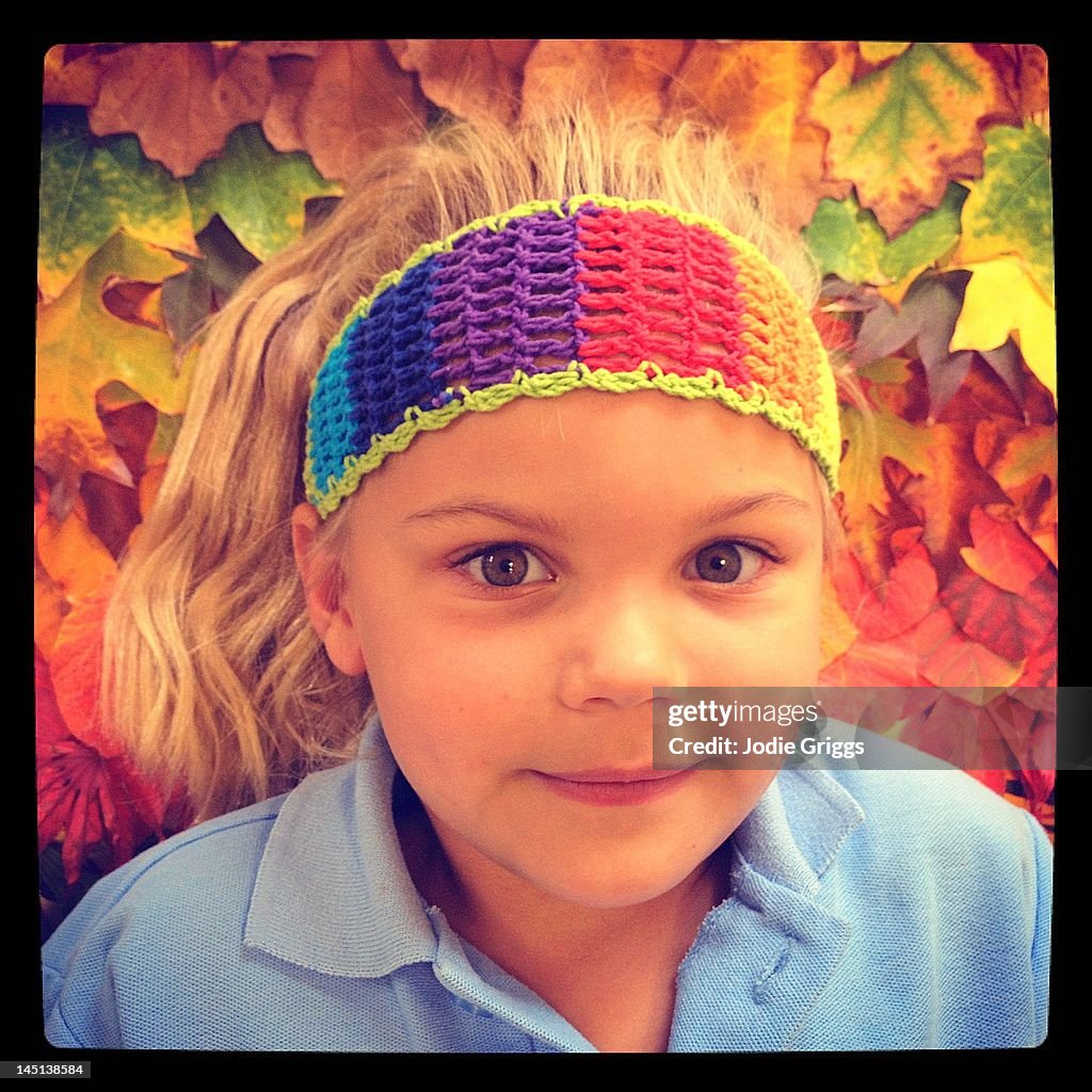 Portrait of girl with rainbow headband