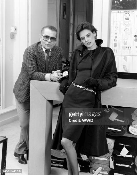 Designer Karl Lagerfeld poses for a portrait with model Ines de la Fressange.