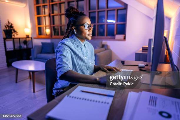 working late at home office - smart working stock pictures, royalty-free photos & images