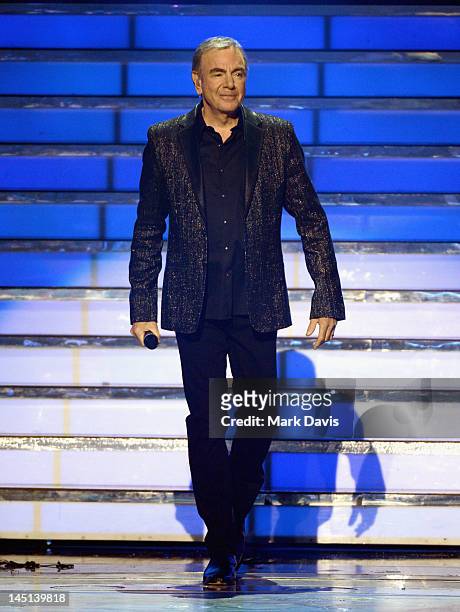 Singer Neil Diamond performs onstage during Fox's "American Idol 2012" results show at Nokia Theatre L.A. Live on May 23, 2012 in Los Angeles,...