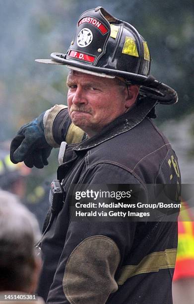 .EastonMA)Firefighter on the scene of the house explosion on Seaver St in Easton..