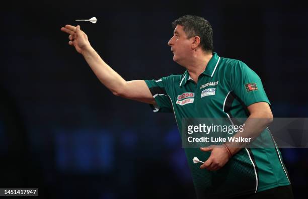Mensur Suljović of Serbia in action during his Round Two Match against Mike De Decker of Belgium During Day Eight of The Cazoo World Darts...