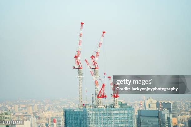 large construction site, cranes - クレーン ストックフォトと画像
