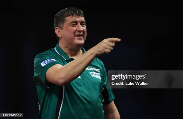 Mensur Suljović of Serbia celebrates the win during his Round Two Match against Mike De Decker of Belgium During Day Eight of The Cazoo World Darts...