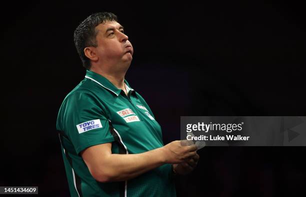 Mensur Suljović of Serbia celebrates the win during his Round Two Match against Mike De Decker of Belgium During Day Eight of The Cazoo World Darts...