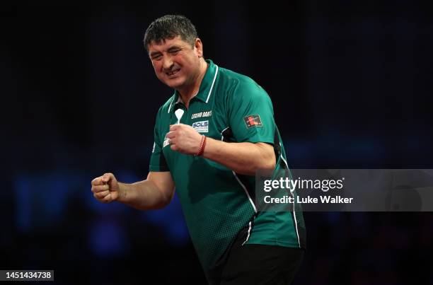 Mensur Suljović of Serbia celebrates the win during his Round Two Match against Mike De Decker of Belgium During Day Eight of The Cazoo World Darts...