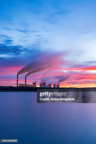 a coal-fired power station in the evening (long exposure) - coal stock pictures, royalty-free photos & images