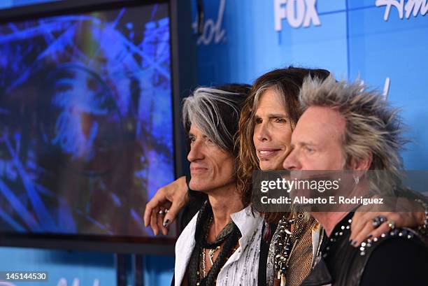 Musicians Joe Perry, Steven Tylerand Joey Kramer pose in the press room during Fox's "American Idol 2012" Finale Results Show at Nokia Theatre L.A....