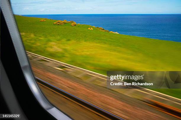 view from a train - train window stock pictures, royalty-free photos & images