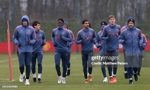 Scott McTominay, Zidane Iqbal, Rhys Bennett, Bruno Fernandes, Christian Eriksen, Antony of Manchester United in action during a first team training...