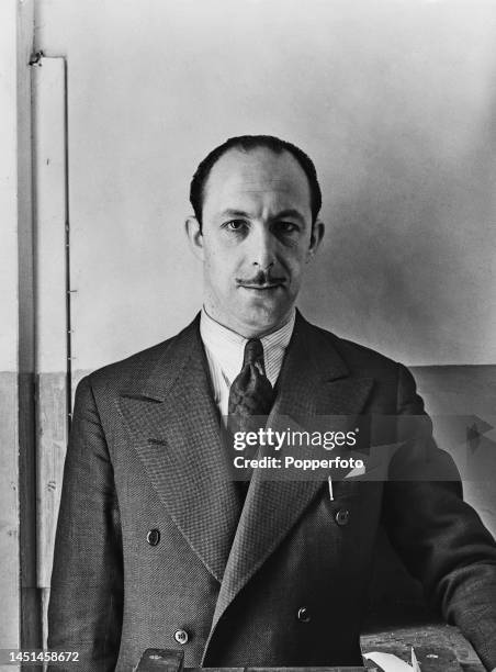 British press photographer Reuben Saidman posed in London in December 1945.