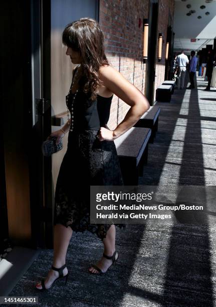 Red Sox slugger David Ortiz's wife Tiffany Ortiz prepares to walk the runway during the From Fenway to the Runway fashion show & luncheon, Monday,...