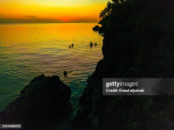 sunset view of paradise beach, santa fe, cebu, philippines - cebu province stock pictures, royalty-free photos & images