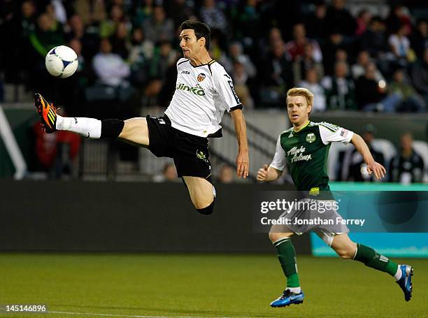 Aritz Aduriz of Valencia leaps for the ball against the Portland Timbers at Jeld-Wen Field on May 23, 2012 in Portland, Oregon.