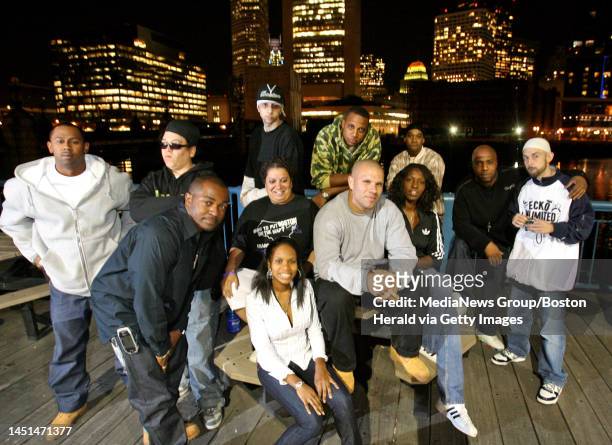 Chris Conroy of Citizen Schools and his partners from the Boston Youth Hip Hop Shop outside their Congress Street office along the Fort Point...
