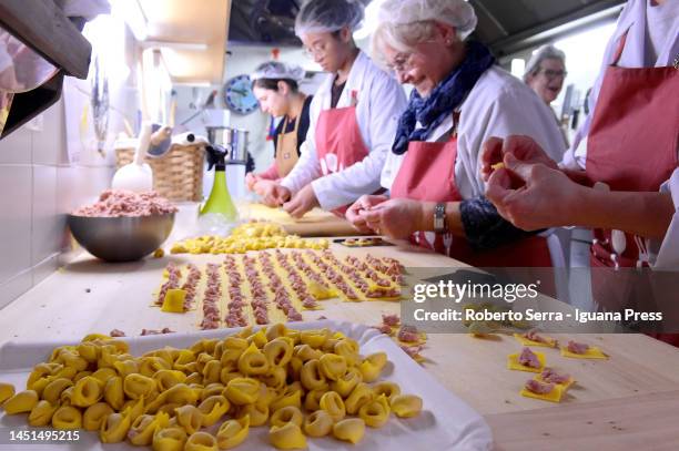 Artisanal pasta makers "Le Sfogline" create traditional tortellini during the Christmas season on December 22, 2022 in Bologna, Italy.
