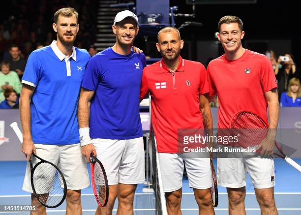 Andy Murray of Scotland and Jamie Murray of Scotland pose with Dan Evans of England and Neal Skupski of England during day two of the Battle of the...