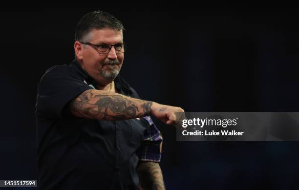 Gary Anderson of Scotland celebrates the win during his Round Two Match against Madars Razma of Lativa During Day Eight of The Cazoo World Darts...