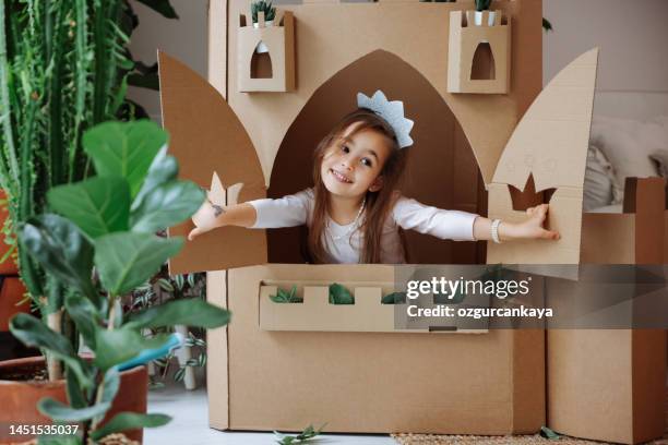 little girl playing with handmade castle - princess castle stock pictures, royalty-free photos & images