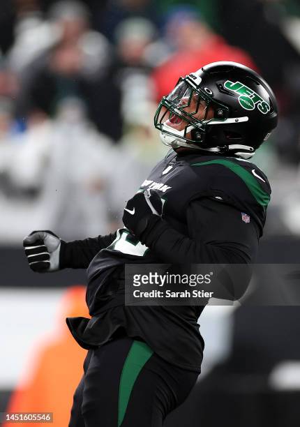 Quinnen Williams of the New York Jets celebrates after sacking quarterback Trevor Lawrence of the Jacksonville Jaguars during the 1st quarter of the...