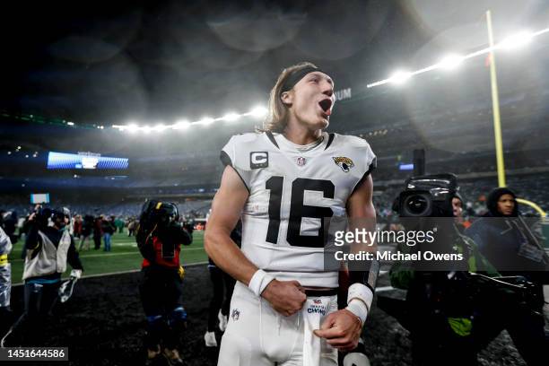 Trevor Lawrence of the Jacksonville Jaguars celebrates after defeating the New York Jets during an NFL football game between the New York Jets and...