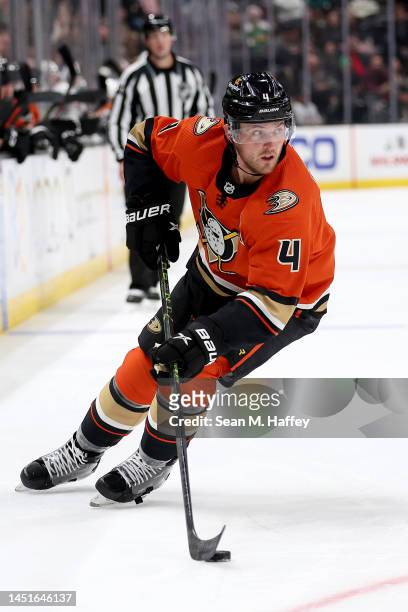 Cam Fowler of the Anaheim Ducks skates with the puck during a game against the Minnesota Wild at Honda Center on December 21, 2022 in Anaheim,...