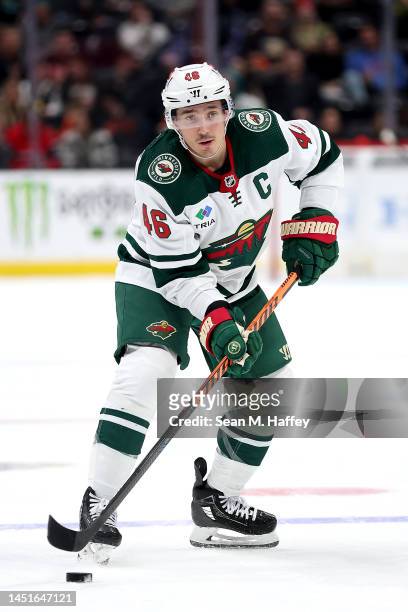 Jared Spurgeon of the Minnesota Wild controls the puck during a game against the Anaheim Ducks at Honda Center on December 21, 2022 in Anaheim,...