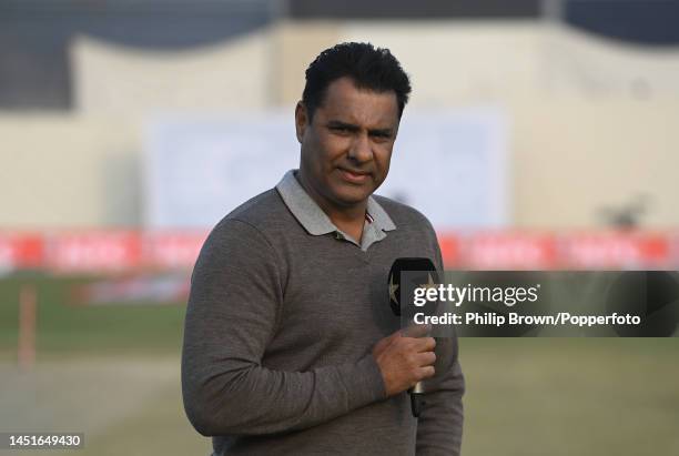 Waqar Younis looks on before the third day of the third Test between Pakistan and England at Karachi National Stadium on December 19, 2022 in...