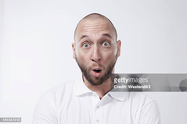 man with surprised look, portrait - faszination stock-fotos und bilder