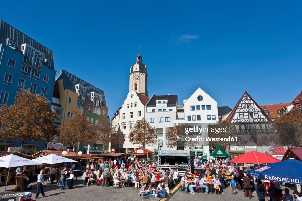 Germany, Thuringia, Jena, People celebrating city festival at market place
