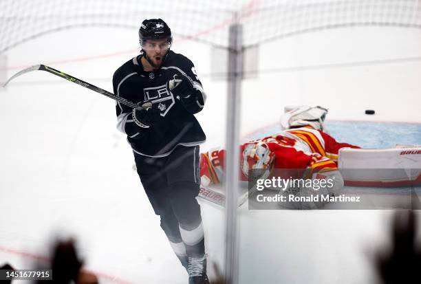 Adrian Kempe of the Los Angeles Kings celebrates the game winning goal against Dan Vladar of the Calgary Flames in overtime at Crypto.com Arena on...