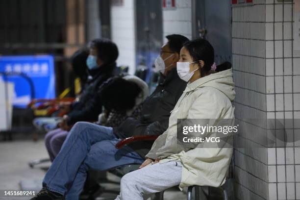 Patients wait to see the doctors at a fever clinic of Dongguan People's Hospital on December 20, 2022 in Dongguan, Guangdong Province of China.