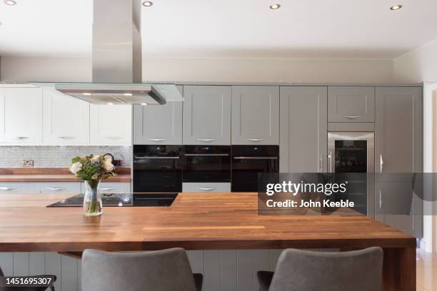 property kitchen interiors - kitchen bench stock pictures, royalty-free photos & images