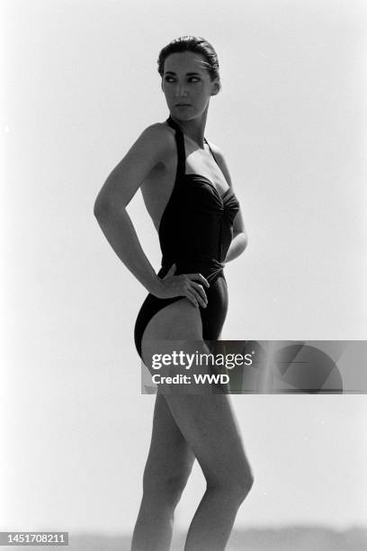 Doreen Erickson models Donna Karan's maillot from her debut swimwear collection. Photo shoot took place in New York City.