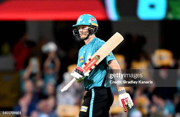 Sam Billings of the Heat celebrates scoring a half century during the Men's Big Bash League match between the Brisbane Heat and the Adelaide Strikers...