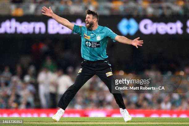 Michael Neser of the Heat celebrates the wicket of Jake Weatherald of the Strikers during the Men's Big Bash League match between the Brisbane Heat...