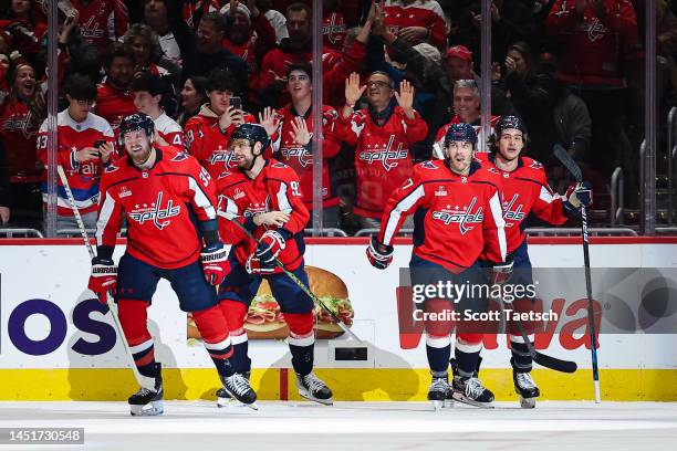 Trevor van Riemsdyk of the Washington Capitals celebrates with teammates after scoring a goal against the Toronto Maple Leafs during the first period...