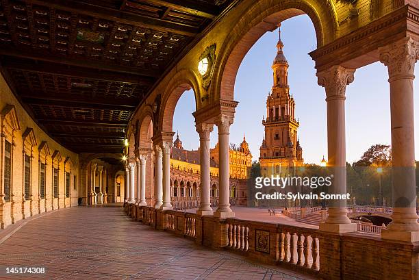 plaza de espana, seville, at dusk - seville stock pictures, royalty-free photos & images