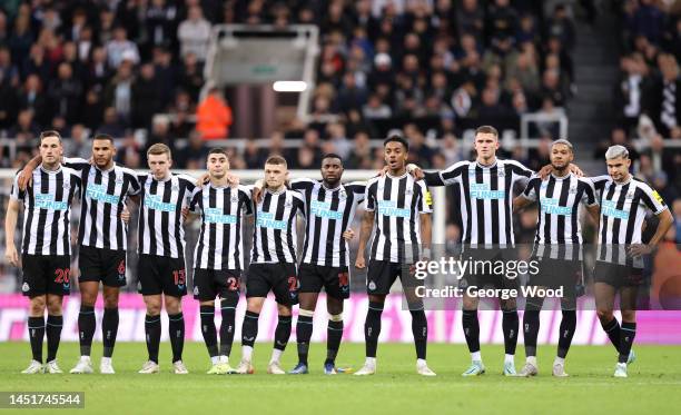 Players of Newcastle United look on in the penalty shoot out during the Carabao Cup Third Round match between Newcastle United and Crystal Palace at...