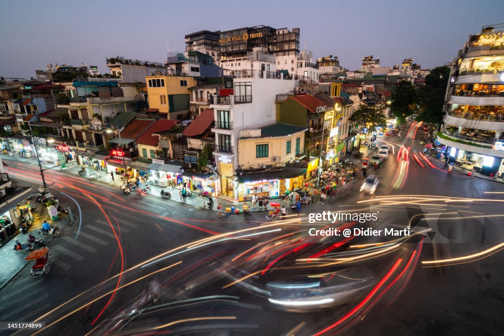 Traffic with blurred motion in Hanoi old quarter in Vietnam