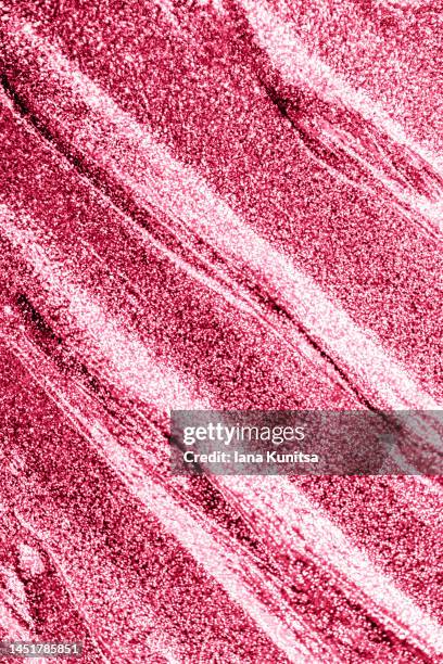 red, pink, viva magenta lipstick smears. lip gloss samples are smudged. beauty cosmetic texture. makeup and skin care products. color of the year 2023. vertical pattern. - pink lipstick smear stock pictures, royalty-free photos & images