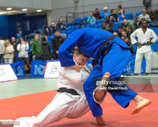 Rhys Thompson of Enfield JC counter throws Harry Lovell-Hewitt of Stroud JC for a wazari to win their u100kg final in extra-time during the 2022...