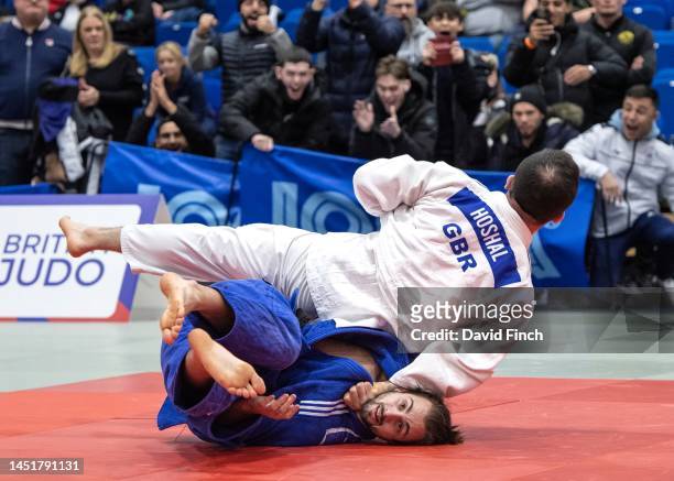 To the great joy of the spectators, Adam Hoshal of The Budokwai throws Spencer Lambert of Huddersfield JC for an ippon to win the u90kg gold medal...
