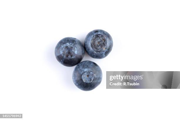 group of fresh juisy blueberries isolated on white background - huckleberry stock pictures, royalty-free photos & images