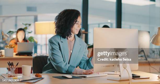 business black woman, computer and office desk at a digital marketing agency typing, writing or research copywriting strategy. editor, design and corporate woman editing on desktop on company website - executive editor stockfoto's en -beelden